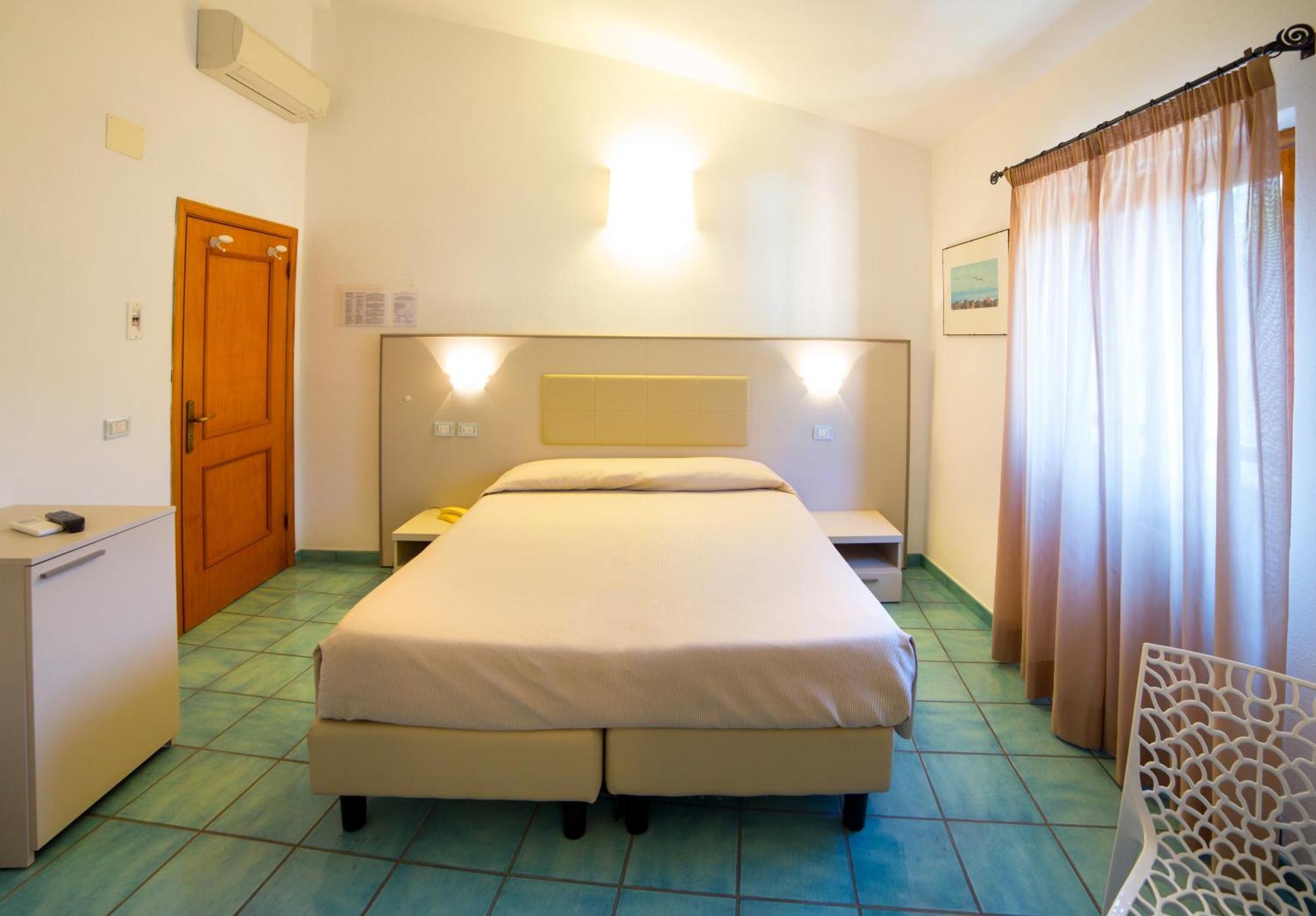 Hotel Saraceno Giglio Porto Pokoj fotografie